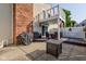 A well-designed backyard with a patio, grill, and seating, perfect for outdoor relaxation and entertaining at 1510 Dominion Dr, Zionsville, IN 46077