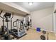 Basement gym featuring a treadmill, elliptical and free weights at 15515 Alameda Pl, Westfield, IN 46074