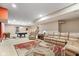 Spacious finished basement featuring a theater area, seating area, and a game table, offering many options at 15515 Alameda Pl, Westfield, IN 46074