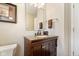 Bathroom featuring a granite countertop vanity with oil rubbed bronze faucet and fixtures, providing a touch of elegance at 15515 Alameda Pl, Westfield, IN 46074