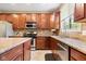 Bright kitchen featuring stainless steel appliances, granite countertops, and a center island at 15515 Alameda Pl, Westfield, IN 46074