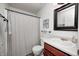 Standard bathroom featuring a framed mirror, vanity, toilet, and shower with a curtain at 1630 Eastfork Dr, Brownsburg, IN 46112
