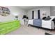 Bright bedroom with a green dresser, bed, and accent decorations at 1630 Eastfork Dr, Brownsburg, IN 46112