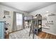 Fun bedroom with a gray loft bed and ladder over a desk and display shelves at 1630 Eastfork Dr, Brownsburg, IN 46112