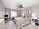 Calming bedroom with plush carpet, ceiling fan, and decorative wall art above a comfortable bed at 1630 Eastfork Dr, Brownsburg, IN 46112