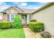 Inviting front entrance with well-manicured landscaping, brick accents, and a charming front door at 1630 Eastfork Dr, Brownsburg, IN 46112