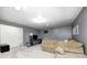 Finished basement with plush carpet, neutral walls, recessed lights, and a comfortable seating area at 1630 Eastfork Dr, Brownsburg, IN 46112