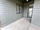 Covered back patio with gray plank siding at 1663 Fernley Dr, Westfield, IN 46074