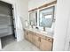 Modern bathroom with double vanity sinks and a shower with glass surround at 1663 Fernley Dr, Westfield, IN 46074