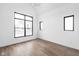 Bright bedroom with large windows and hardwood floors at 1663 Fernley Dr, Westfield, IN 46074