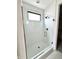 Bathroom shower with white subway tile, glass door and mosaic tile flooring at 1663 Fernley Dr, Westfield, IN 46074