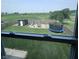 A spacious backyard features a shed, playground, trampoline, and green grass at 1721 N Kaleigh Ln, Greensburg, IN 47240
