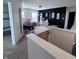 Bright bonus room features black accent wall, neutral carpeting, and great natural light from large windows at 1721 N Kaleigh Ln, Greensburg, IN 47240