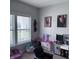 Inviting playroom featuring toy kitchen set, comfortable seating, and ample natural light at 1721 N Kaleigh Ln, Greensburg, IN 47240