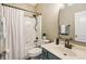 Modern bathroom with a shower-tub combo, sleek vanity, and stylish mirror at 1893 Devonshire Ave, Avon, IN 46123
