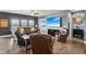 Cozy living room featuring a large TV, plush seating, and ample natural light at 1893 Devonshire Ave, Avon, IN 46123