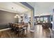 Spacious open-concept design connecting the dining area, kitchen, and living room at 1893 Devonshire Ave, Avon, IN 46123