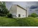 A spacious backyard extends from the home with a well-maintained lawn at 19187 Outer Bank Rd, Noblesville, IN 46062