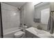 The bathroom features a shower-tub combination and a sink vanity with modern finishes at 19187 Outer Bank Rd, Noblesville, IN 46062
