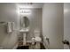 Half bathroom featuring modern fixtures and a pedestal sink at 19187 Outer Bank Rd, Noblesville, IN 46062