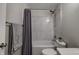 Well-lit bathroom featuring a shower-tub combination and sink vanity offers comfort and style at 19187 Outer Bank Rd, Noblesville, IN 46062