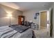 The bedroom includes a study area and is a serene retreat for relaxation and productivity at 19187 Outer Bank Rd, Noblesville, IN 46062
