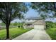 Charming two-story home with a welcoming front porch and long driveway at 19187 Outer Bank Rd, Noblesville, IN 46062