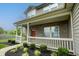 Charming front porch with brick accents and manicured landscaping at 19187 Outer Bank Rd, Noblesville, IN 46062