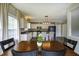Modern eat-in kitchen featuring sleek appliances, a large island with bar seating, and lots of light at 19187 Outer Bank Rd, Noblesville, IN 46062
