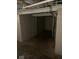 Spacious unfinished basement with painted concrete walls and exposed piping overhead at 1943 N Drexel Ave, Indianapolis, IN 46218
