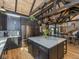 Kitchen with center island, stainless steel appliances, and open floor plan at 2004 Layton Rd, Anderson, IN 46011
