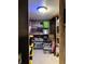 Basement storage space featuring shelving and ample room for storage at 2032 N Auburn St, Speedway, IN 46224