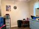 Bedroom showcasing neutral walls, fan lighting, a dark colored hardwood floor and large windows at 2032 N Auburn St, Speedway, IN 46224