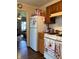 Bright kitchen with ample storage space, and adjoining dining area at 2032 N Auburn St, Speedway, IN 46224