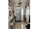 Welcoming entryway with tile floors, decorative accents, and ample lighting at 2302 Rolling Oak Dr, Indianapolis, IN 46214