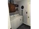 Functional laundry room with Colts and Indiana decor and washer and dryer at 2302 Rolling Oak Dr, Indianapolis, IN 46214