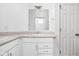 Well-lit bathroom vanity with double sinks and contemporary fixtures at 2326 N Pennsylvania St # 6, Indianapolis, IN 46205