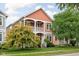 Attractive two-story home with double balconies and mature landscaping at 2326 N Pennsylvania St # 6, Indianapolis, IN 46205