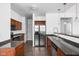 Kitchen with stainless steel appliances, granite countertops, and cherry cabinets at 2326 N Pennsylvania St # 6, Indianapolis, IN 46205