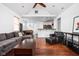 Bright, open-concept living room with hardwood floors and a connecting kitchen area at 2326 N Pennsylvania St # 6, Indianapolis, IN 46205
