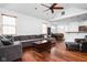 Spacious living area with hardwood floors, a ceiling fan and an open floor plan at 2326 N Pennsylvania St # 6, Indianapolis, IN 46205