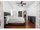 Spacious main bedroom features a ceiling fan, en suite bathroom and walk in closet for maximum convenience at 2326 N Pennsylvania St # 6, Indianapolis, IN 46205