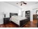 Large main bedroom featuring a ceiling fan, en suite bathroom and walk in closet at 2326 N Pennsylvania St # 6, Indianapolis, IN 46205
