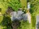 Overhead view of home highlighting roof, landscaping, and the nearby garden at 233 Saddlebrook Dr, Zionsville, IN 46077
