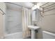 Bathroom with a tub and shower combination and a pedestal sink at 233 Saddlebrook Dr, Zionsville, IN 46077
