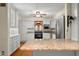 Modern kitchen with stainless steel appliances and granite countertops at 233 Saddlebrook Dr, Zionsville, IN 46077