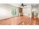 Living room with hardwood floors and a built-in bookcase and cabinets at 233 Saddlebrook Dr, Zionsville, IN 46077