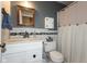 Bathroom featuring a white vanity, decorative tile, and a shower with curtain at 2766 Del Prado Dr # 6, Indianapolis, IN 46227