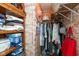Walk-in closet with ample storage space and exposed brick wall adding character at 2766 Del Prado Dr # 6, Indianapolis, IN 46227
