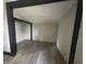 A cozy bedroom showcases new floors and freshly painted walls and trim at 2826 Station St, Indianapolis, IN 46218